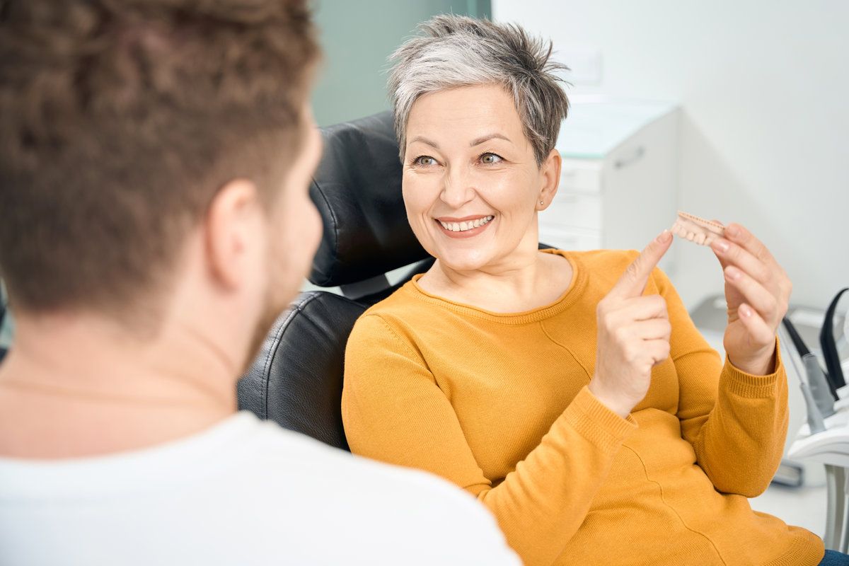 Dentist discussing dental treatment options.